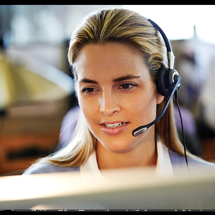 Woman wearing corded headset