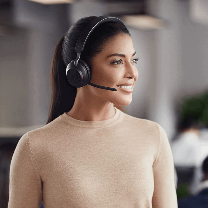 Brunette woman wearing Evolve2 65 headset