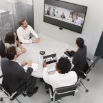 Jabra Video Conferencing Equipment with People in Huddle Room