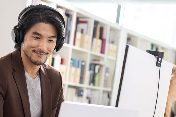 Dual Ear Wireless USB Headset in Busy Office